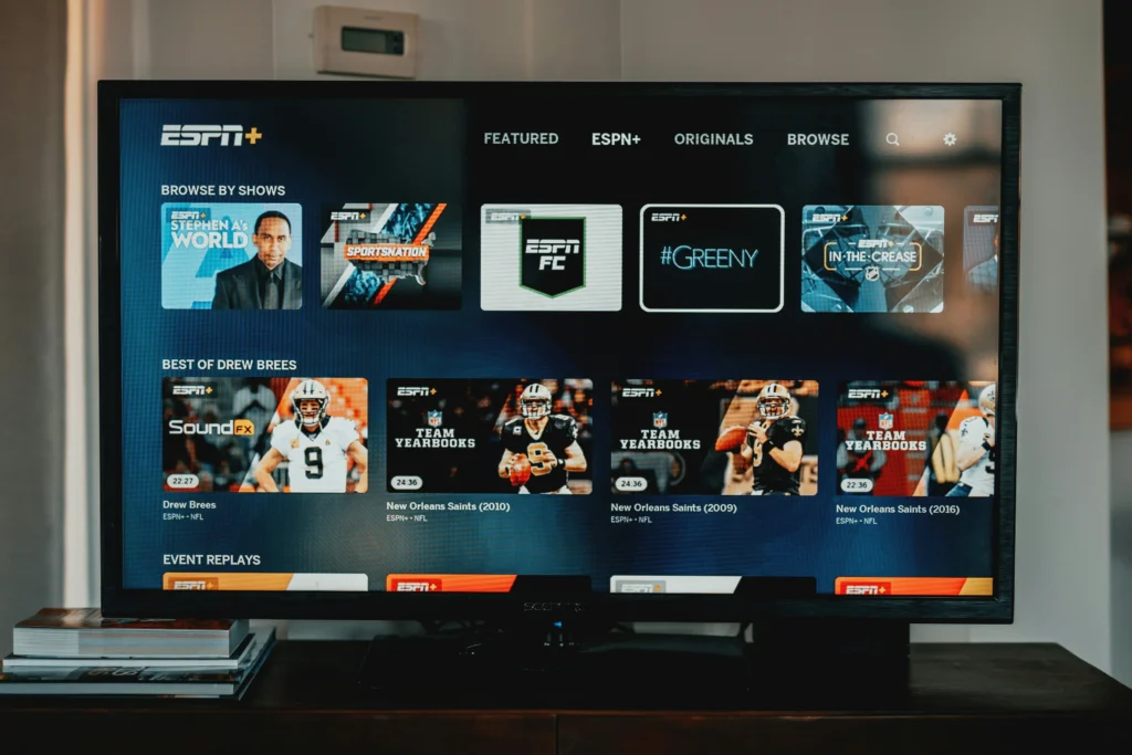 Modern smart TV interface showing IPTV lifetime subscription service with live channels, movies, and series in high-quality streaming experience.